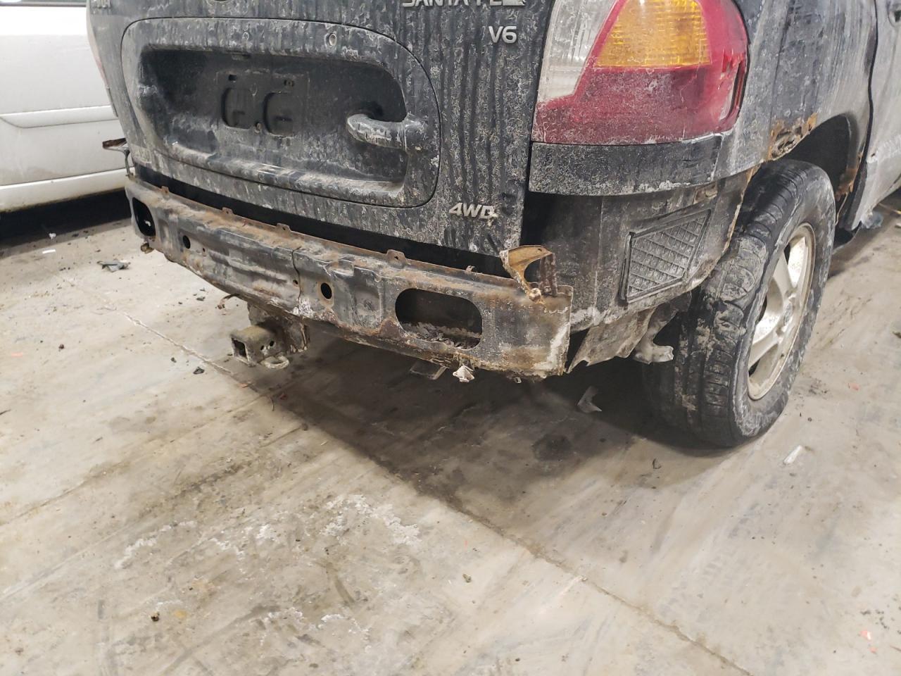 Photo 9 from auction – 2004 HYUNDAI SANTA FE G with VIN KM8SC73D64U616884