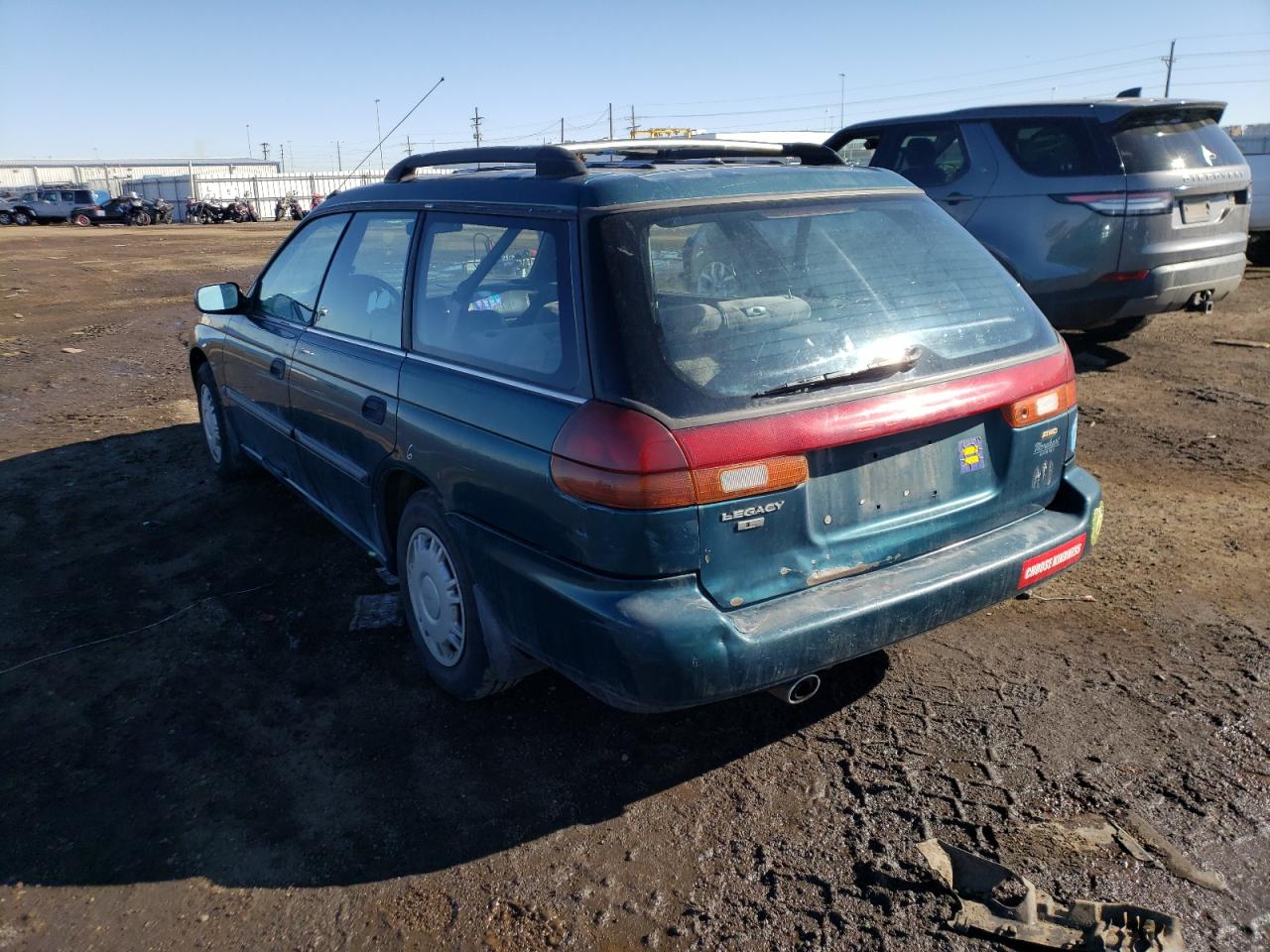 Photo 13 from auction – 1997 SUBARU LEGACY L with VIN 4S3BK4356V6317545