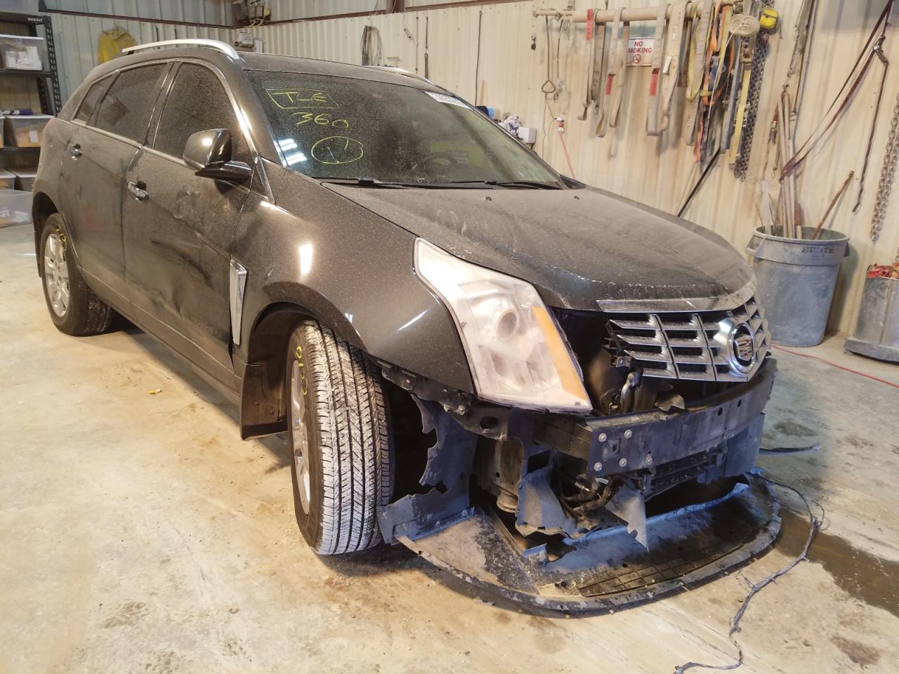 CADILLAC SRX LUXURY 2014 with VIN 3GYFNBE35ES565624 - Photo from auction