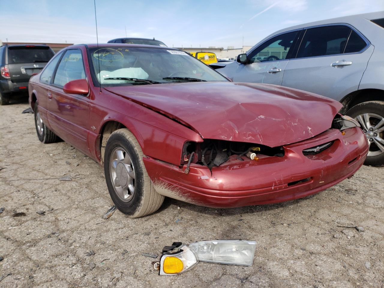 FORD THUNDERBIR 1997 with VIN 1FALP62WXVH157885 - Photo from auction