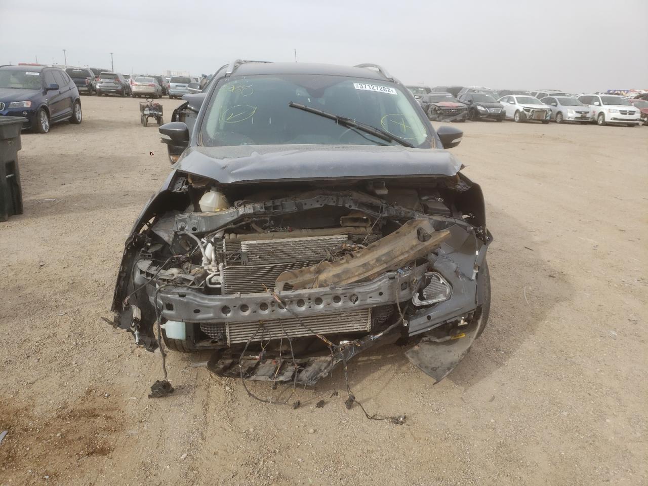 Photo 9 from auction – 2019 FORD ESCAPE TIT with VIN 1FMCU9J93KUB85851