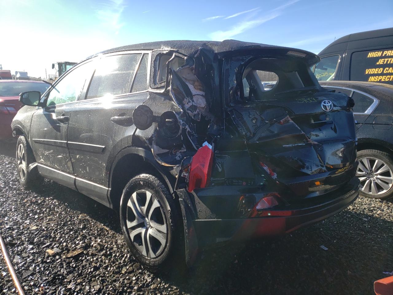Photo 3 from auction – 2018 TOYOTA RAV4 LE with VIN 2T3BFREV0JW742282