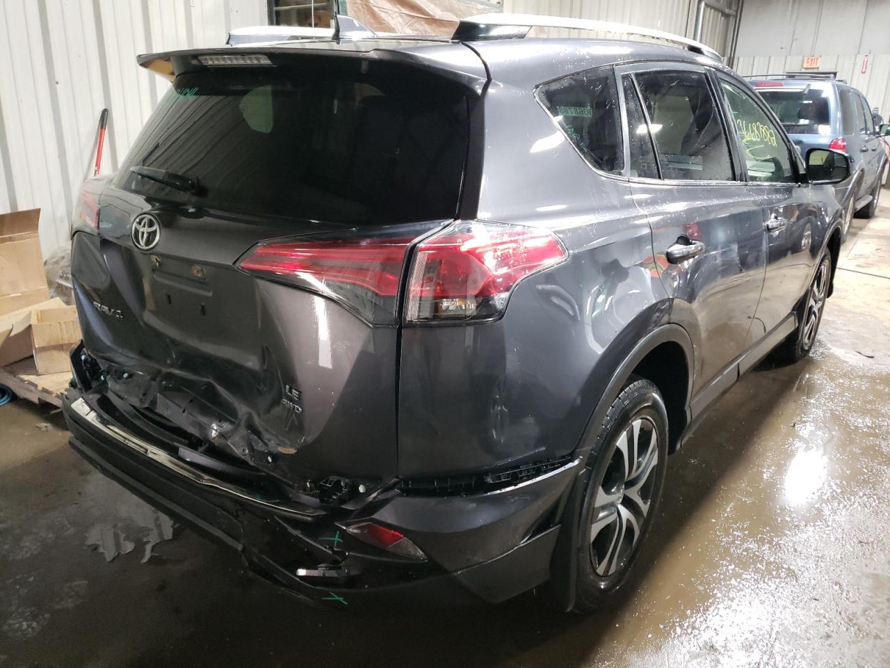 Photo 4 from auction – 2017 TOYOTA RAV4 LE with VIN JTMBFREV7HJ126118
