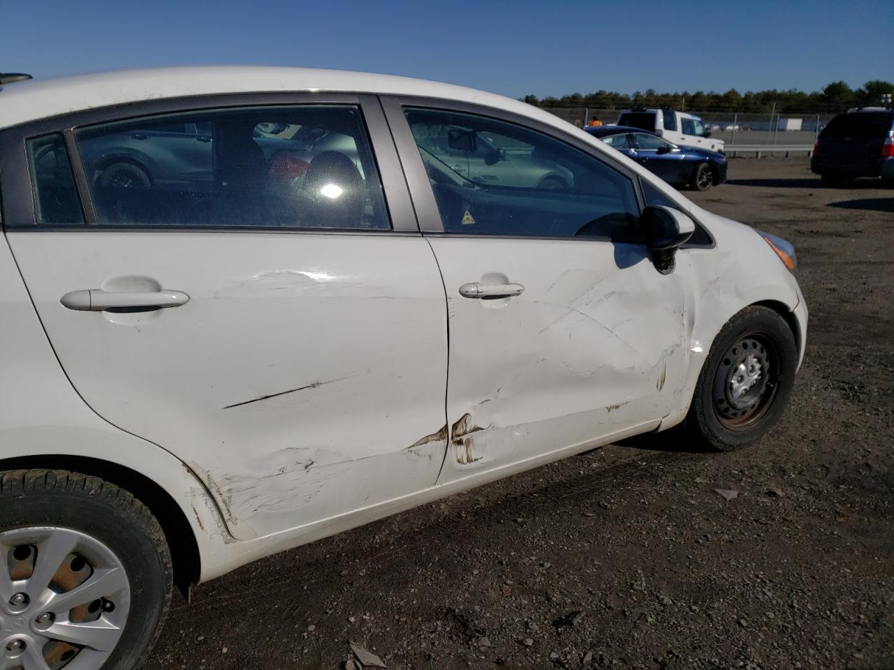 Photo 9 from auction – 2014 KIA RIO LX with VIN KNADM4A36E6389668