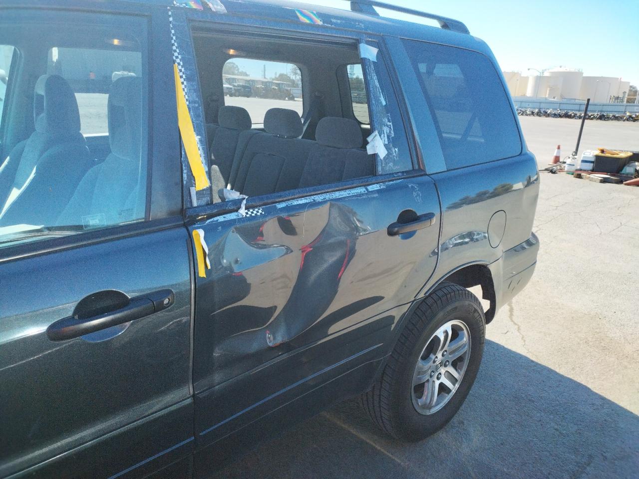 Photo 9 from auction – 2003 HONDA PILOT EX with VIN 2HKYF18433H533952