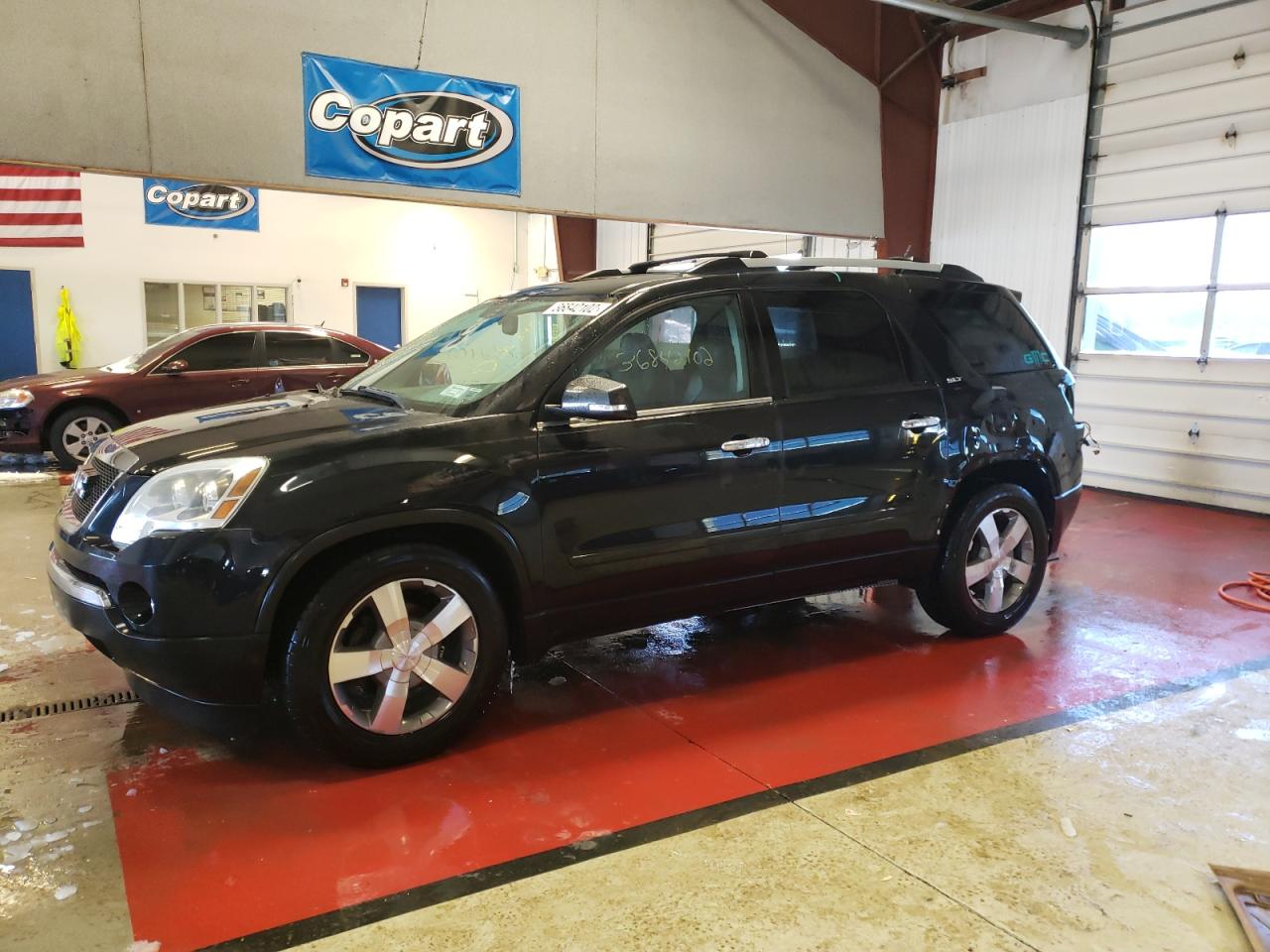 Photo 9 from auction – 2011 GMC ACADIA SLT with VIN 1GKKVRED6BJ128853
