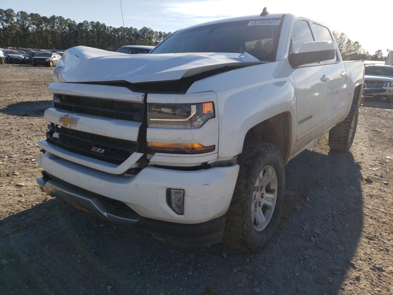 Photo 2 from auction – 2017 CHEVROLET SILVERADO with VIN 3GCUKREC7HG372316