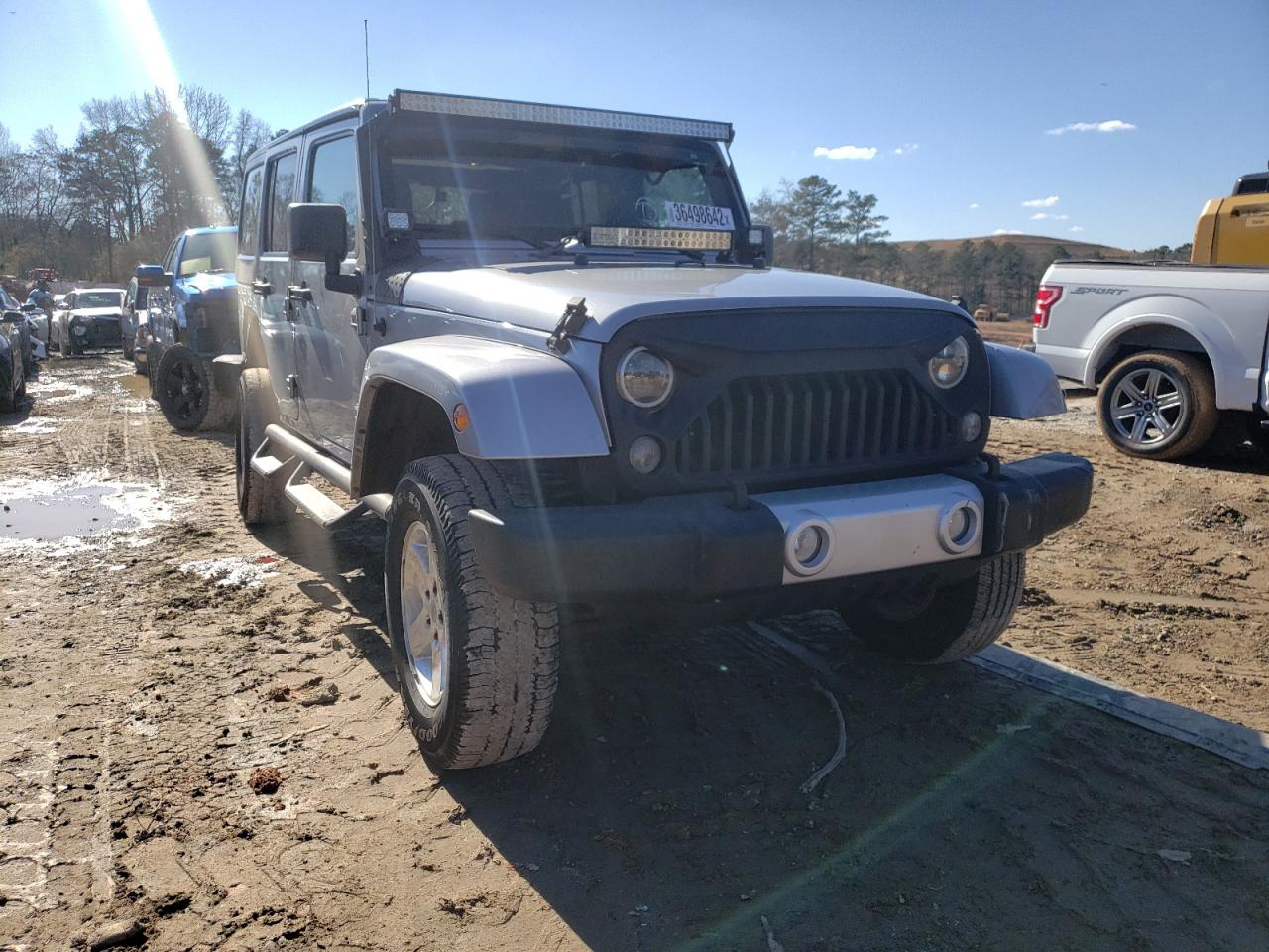 JEEP WRANGLER U 2014 with VIN 1C4BJWEG0EL139212 - Photo from auction