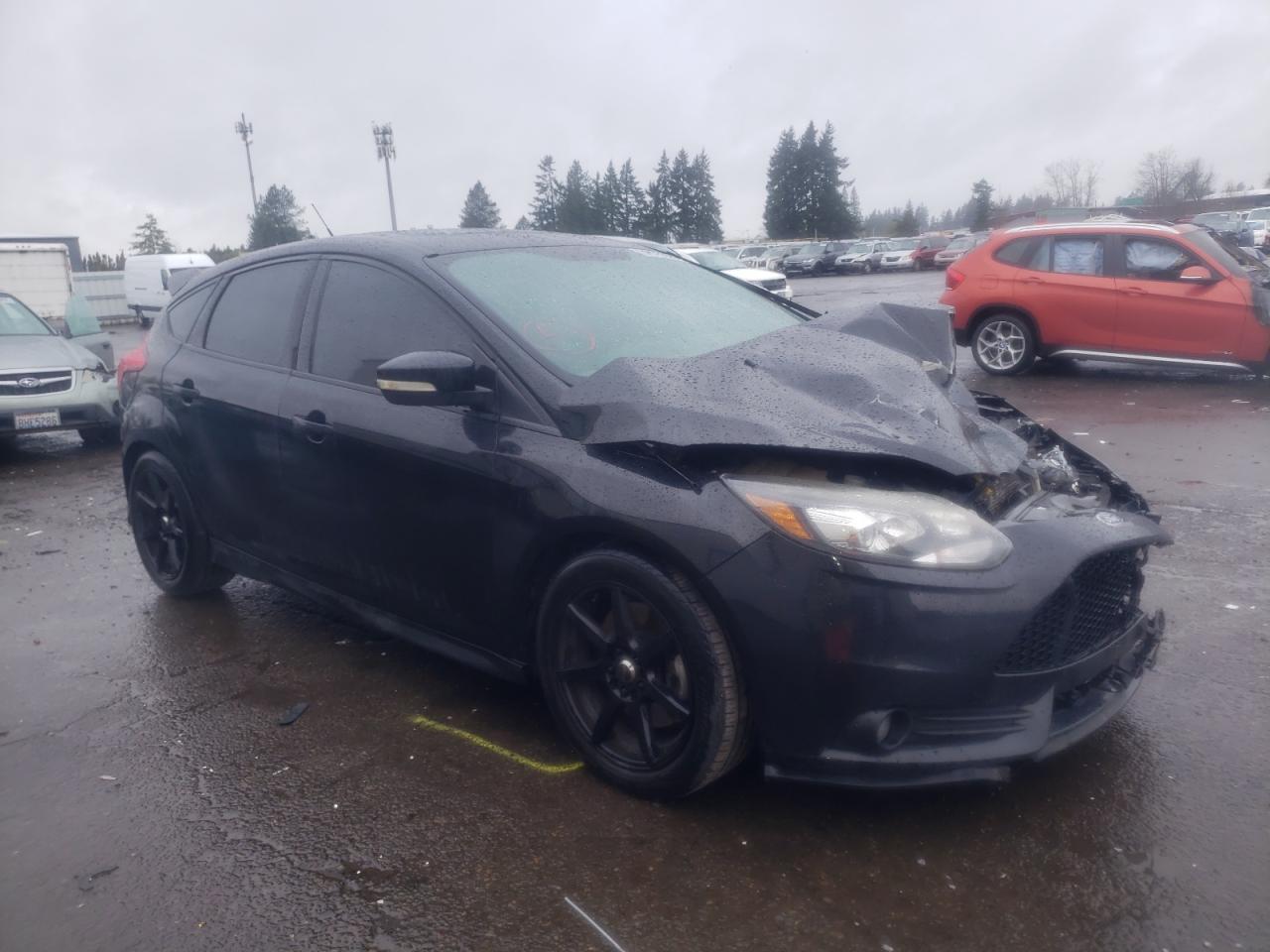 FORD FOCUS ST 2013 with VIN 1FADP3L93DL185650 - Photo from auction