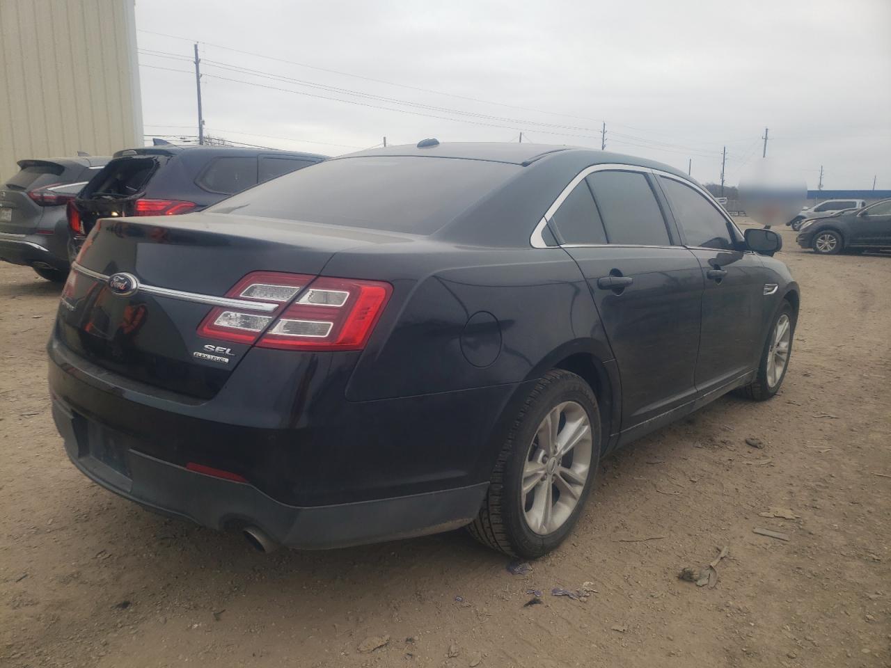 Photo 4 from auction – 2013 FORD TAURUS SEL with VIN 1FAHP2E84DG233715