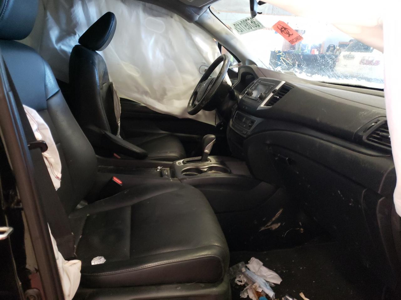 Photo 5 from auction – 2017 HONDA RIDGELINE with VIN 5FPYK3F59HB023394