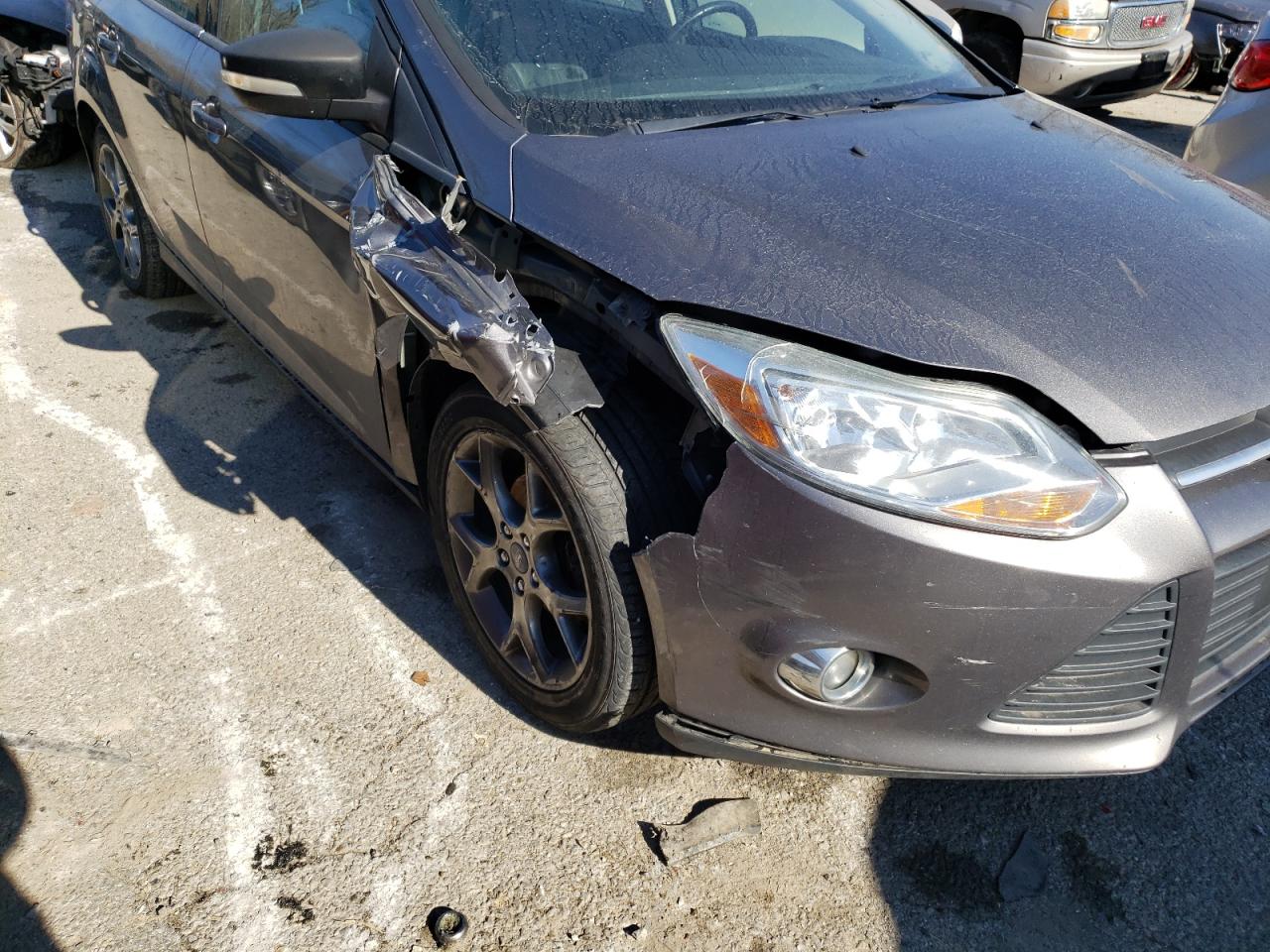 Photo 9 from auction – 2013 FORD FOCUS SE with VIN 1FADP3F24DL242520