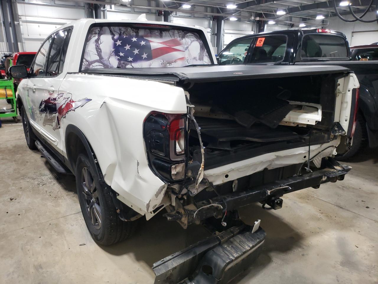 Photo 3 from auction – 2018 HONDA RIDGELINE with VIN 5FPYK3F19JB014343
