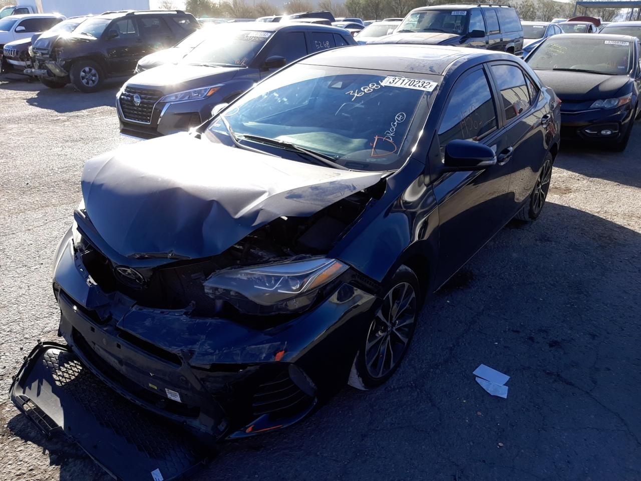 Photo 2 from auction – 2019 TOYOTA COROLLA L with VIN 5YFBURHE1KP856210