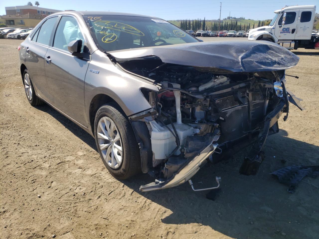 TOYOTA CAMRY HYBR 2016 with VIN 4T1BD1FK3GU180570 - Photo from auction