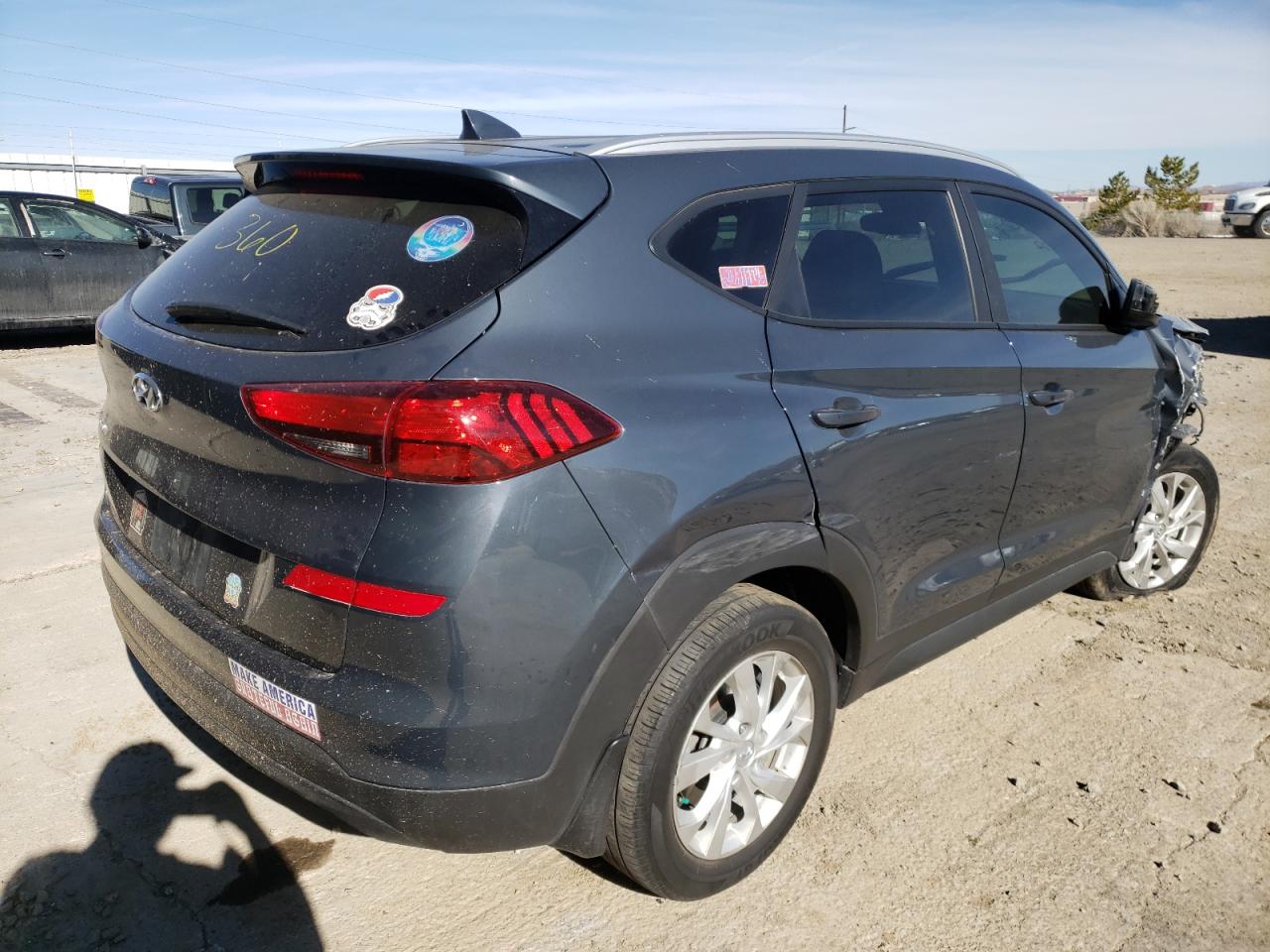 Photo 4 from auction – 2020 HYUNDAI TUCSON LIM with VIN KM8J33A40LU159589