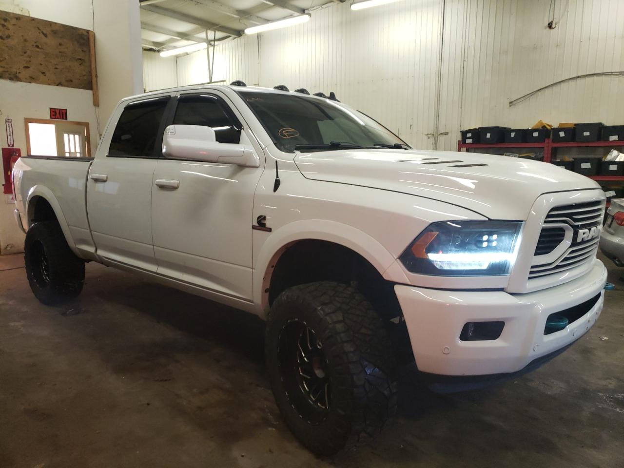 RAM 3500 SLT 2018 with VIN 3C63R3DL5JG140641 - Photo from auction