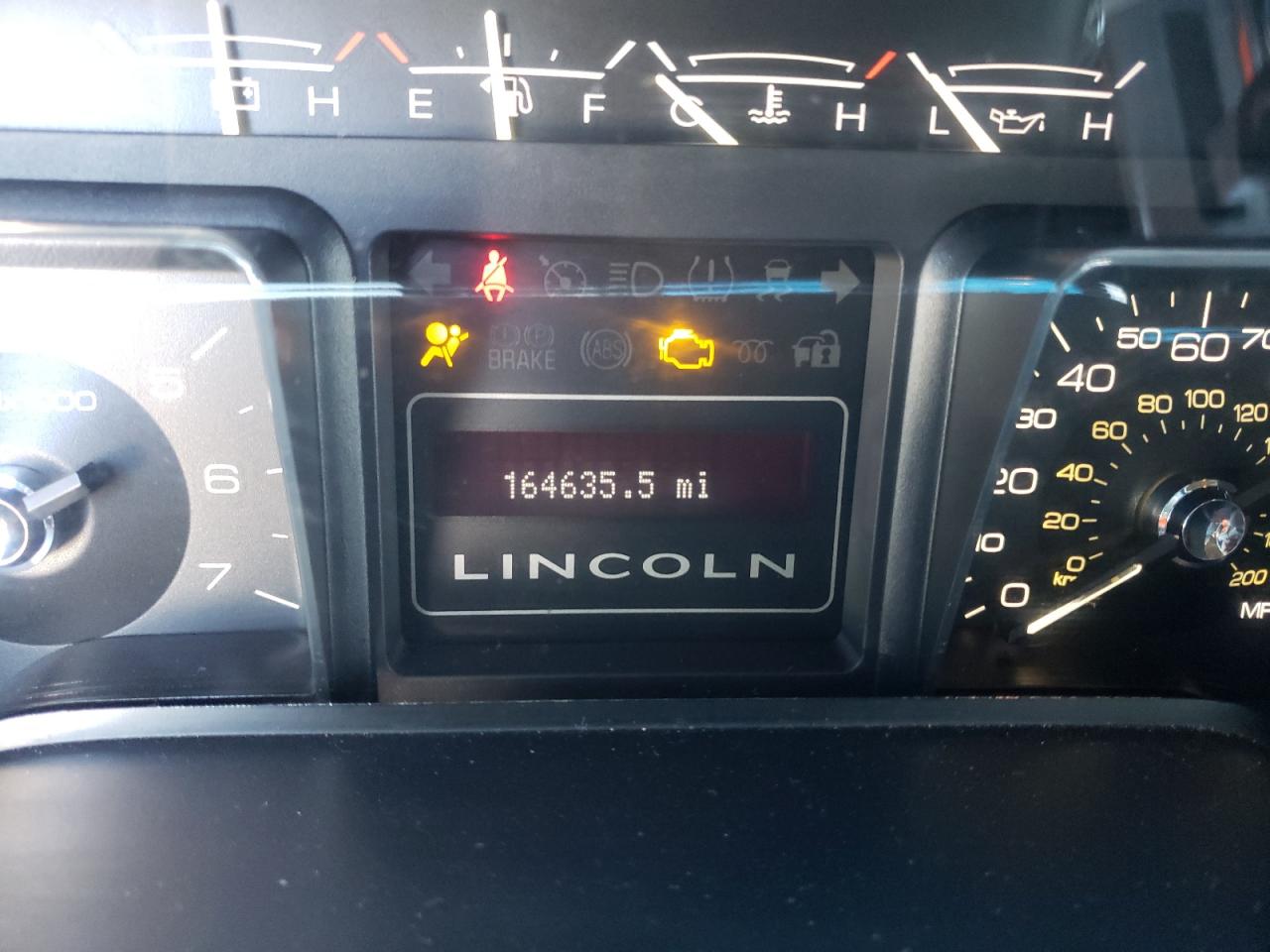 Photo 8 from auction – 2010 LINCOLN NAVIGATOR with VIN 5LMJJ2J53AEJ11114