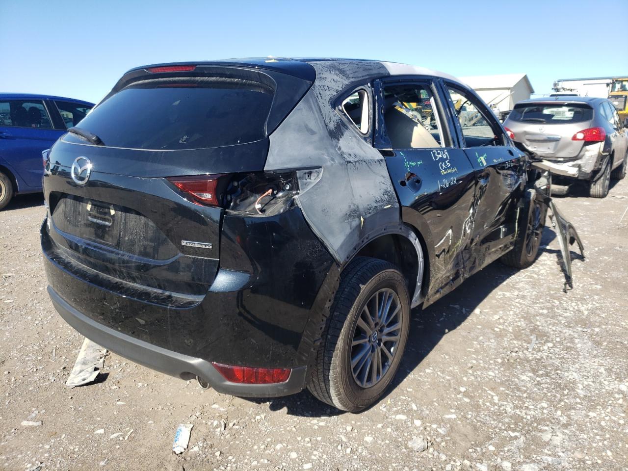 Photo 4 from auction – 2021 MAZDA CX-5 TOURI with VIN JM3KFACMXM1310160