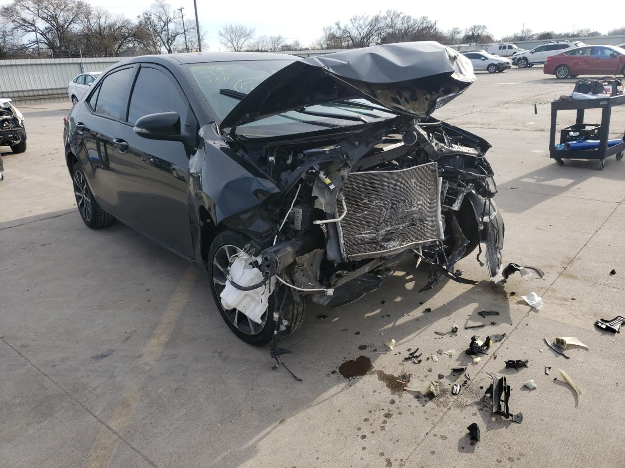 TOYOTA COROLLA L 2017 with VIN 2T1BURHEXHC827328 - Photo from auction