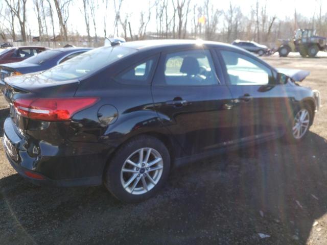 Photo 4 from auction – 2016 FORD FOCUS SE with VIN 1FADP3F21GL317856