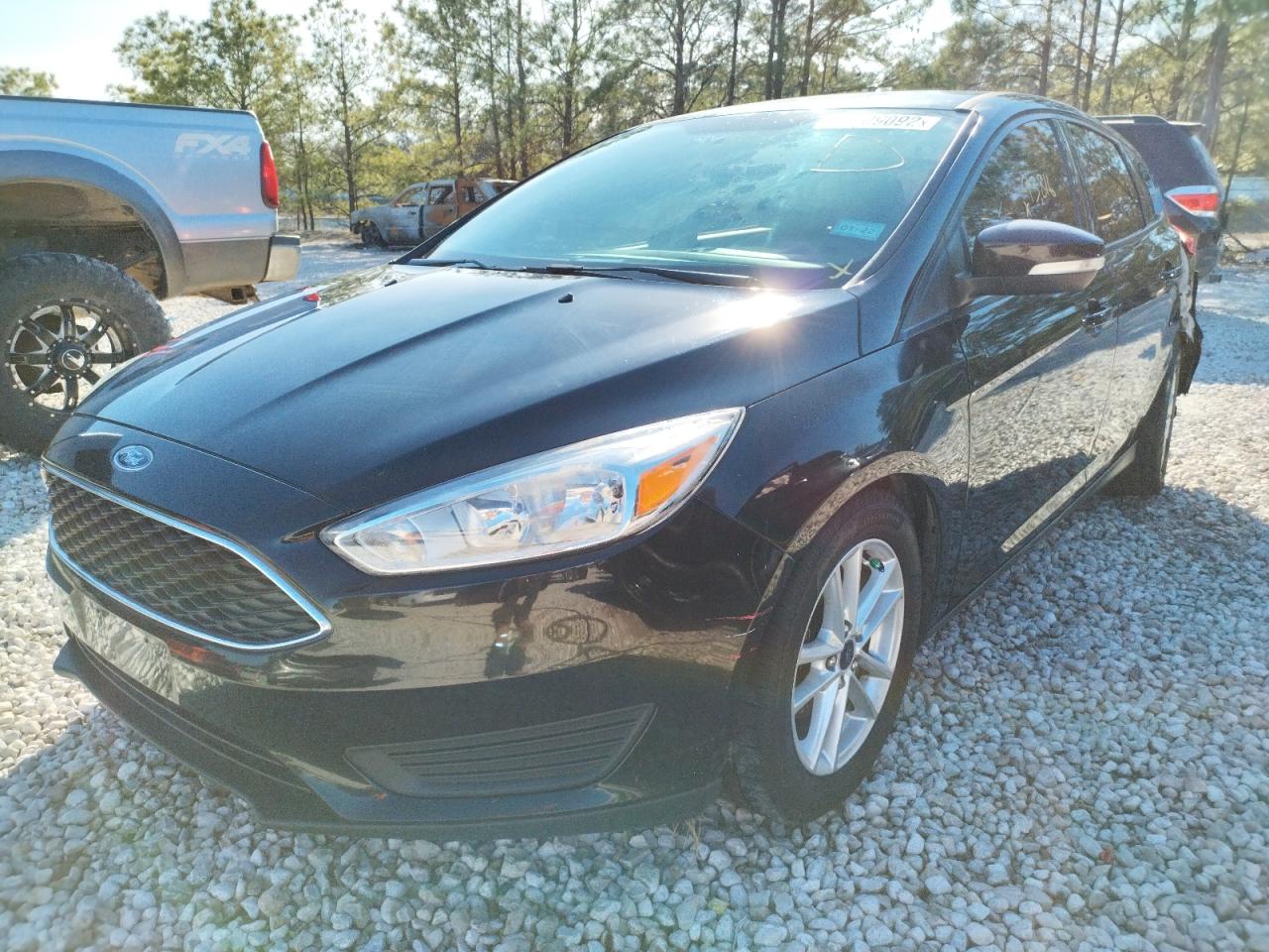 Photo 2 from auction – 2016 FORD FOCUS SE with VIN 1FADP3K27GL213720