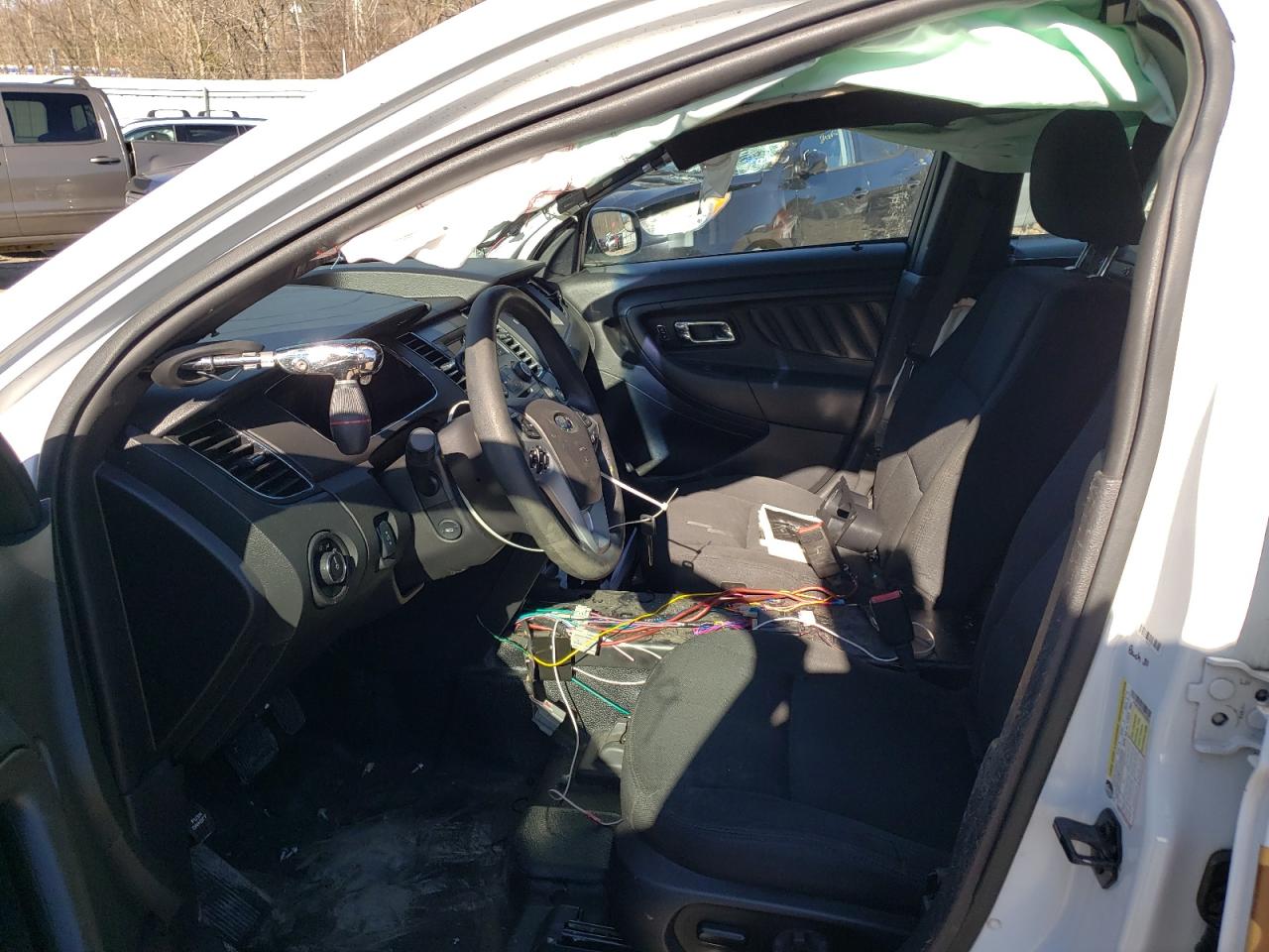Photo 5 from auction – 2015 FORD TAURUS POL with VIN 1FAHP2MK8FG142575