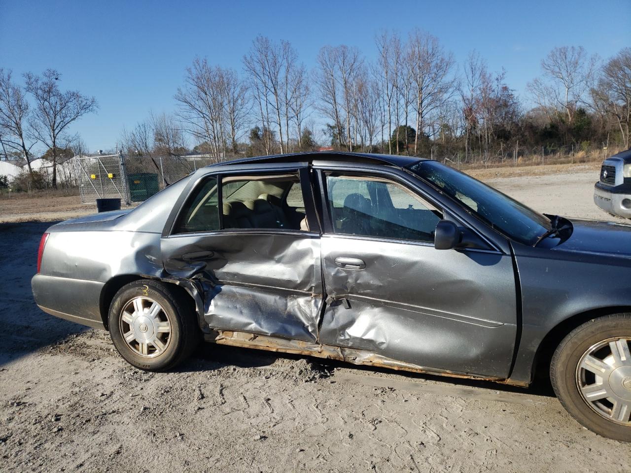 Photo 9 from auction – 2004 CADILLAC DEVILLE with VIN 1G6KD54Y74U159237