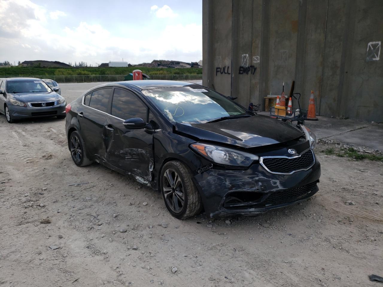 KIA FORTE EX 2014 with VIN KNAFX4A86E5090327 - Photo from auction