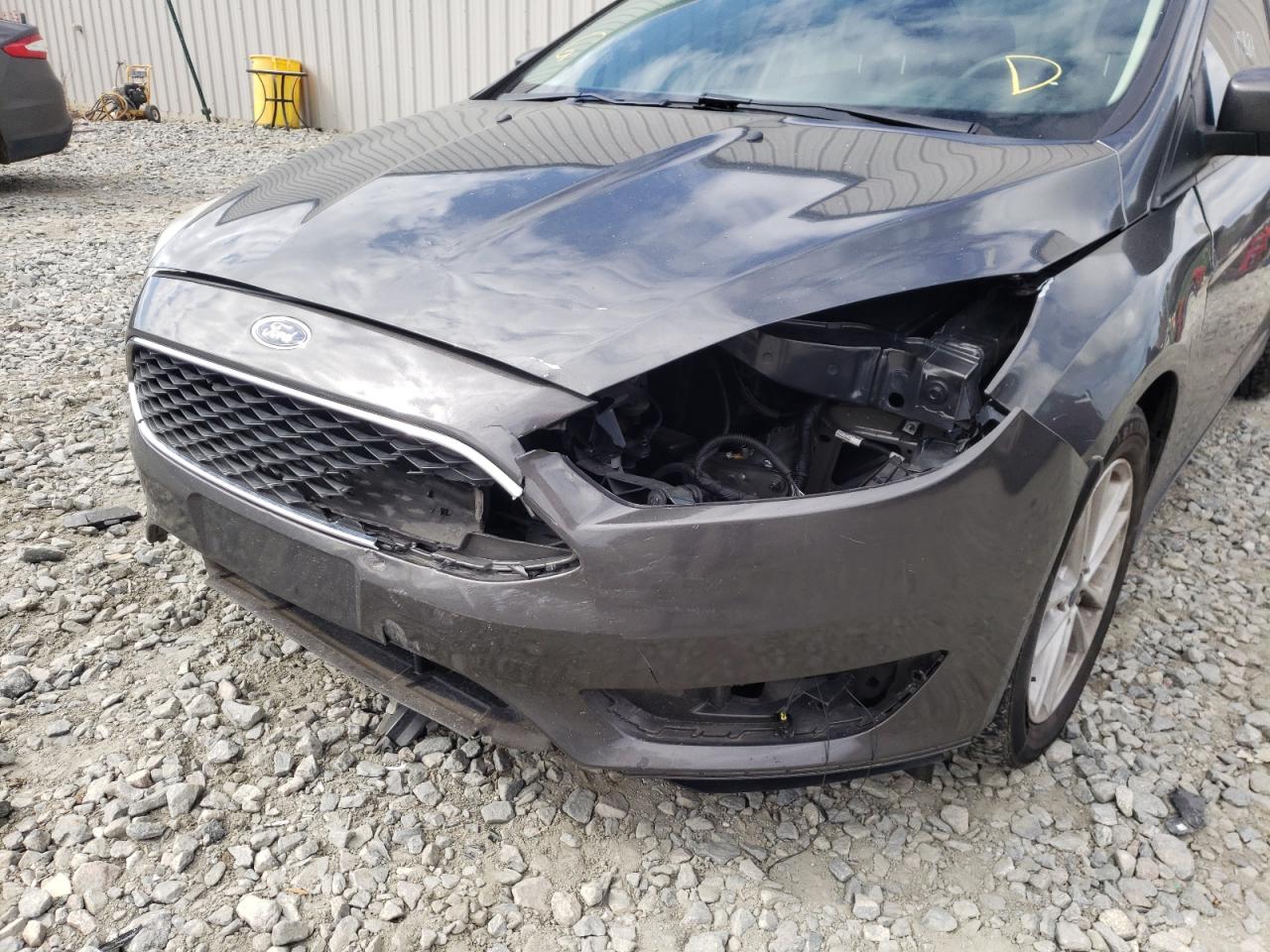 Photo 9 from auction – 2018 FORD FOCUS SE with VIN 1FADP3F25JL280348