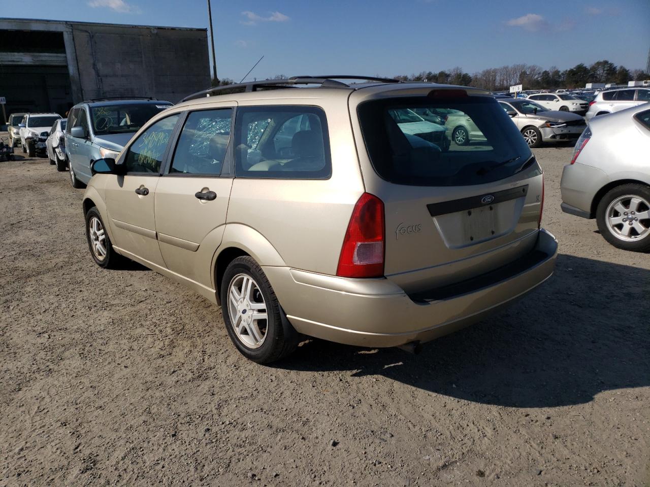 Photo 3 from auction – 2000 FORD FOCUS with VIN 1FAHP3639YW303763