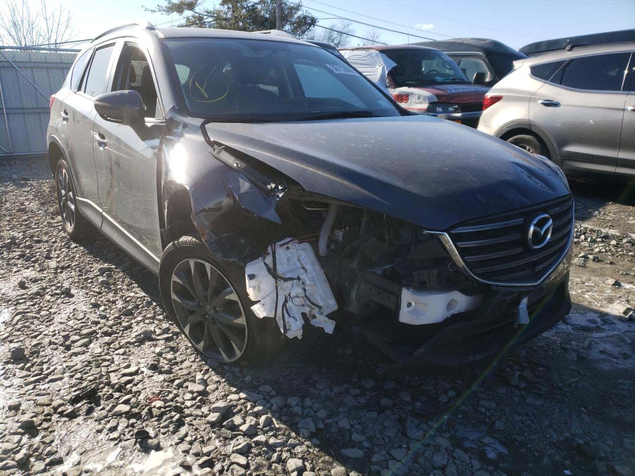 MAZDA CX-5 GT 2016 with VIN JM3KE4DY0G0897856 - Photo from auction