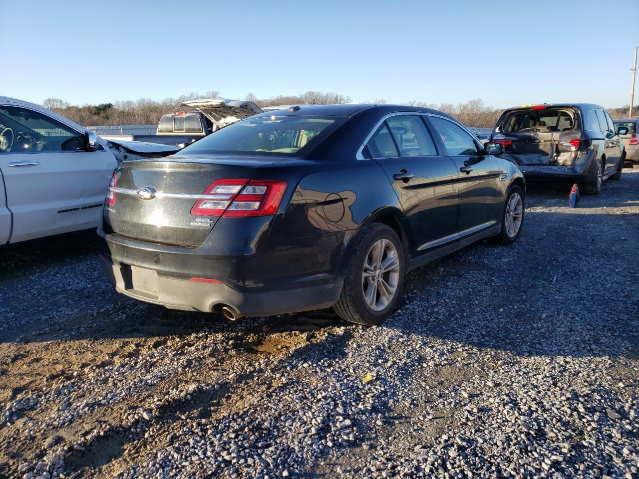 Photo 4 from auction – 2014 FORD TAURUS SEL with VIN 1FAHP2E83EG130528
