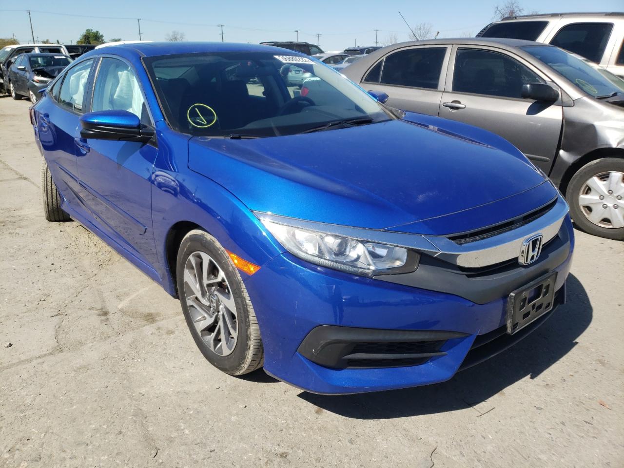 HONDA CIVIC EX 2017 with VIN 19XFC2F73HE221158 - Photo from auction