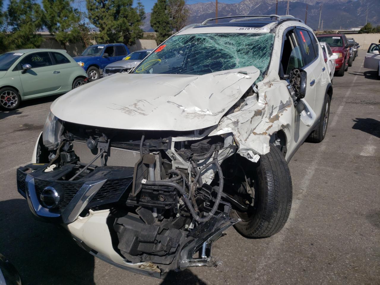 Photo 2 from auction – 2015 NISSAN ROGUE S with VIN 5N1AT2MT7FC861108