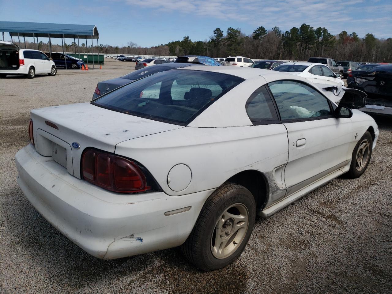 Photo 4 from auction – 1997 FORD MUSTANG with VIN 1FALP4049VF121526