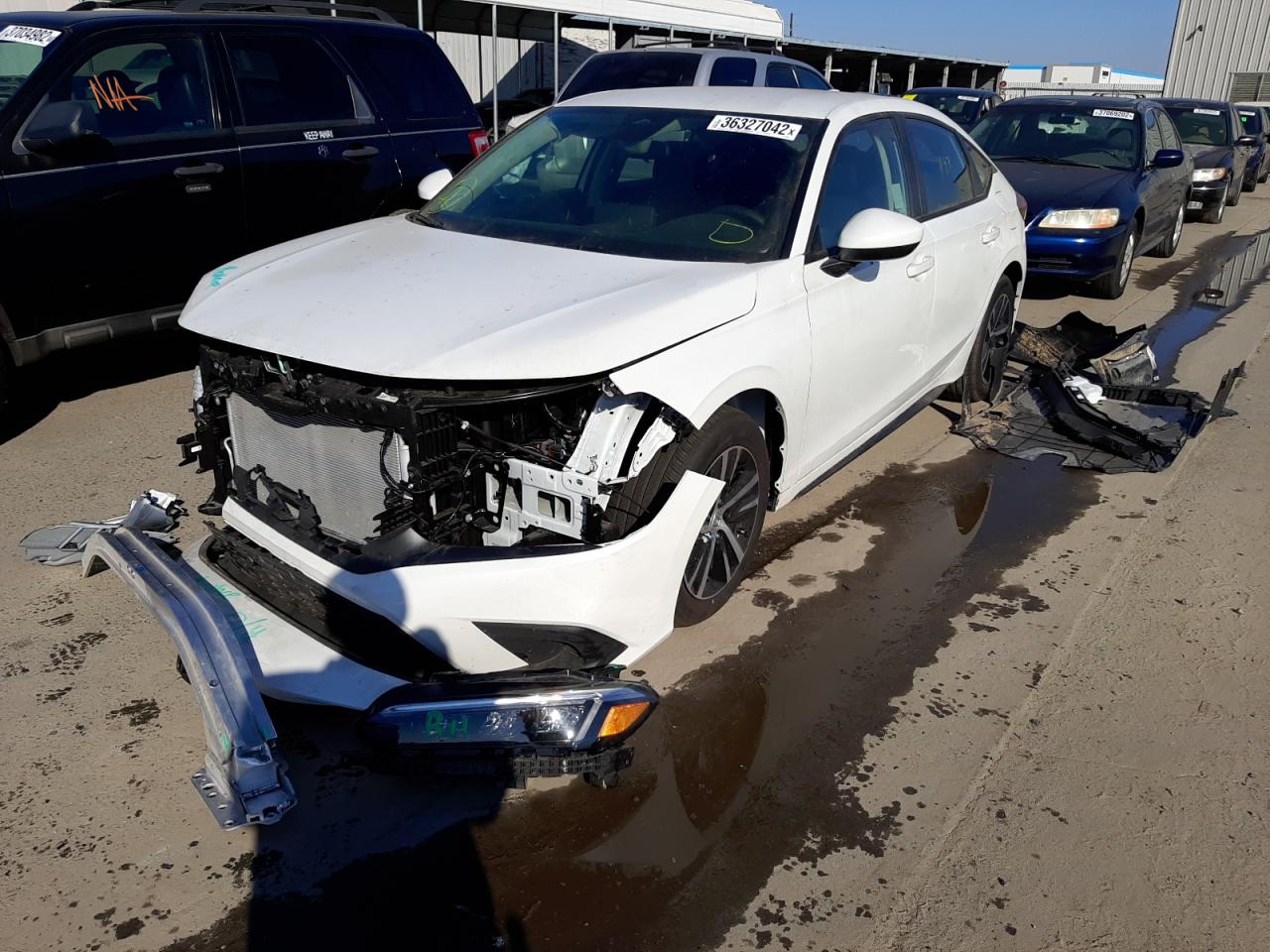 Photo 2 from auction – 2022 HONDA CIVIC LX with VIN 19XFL2H57NE000329
