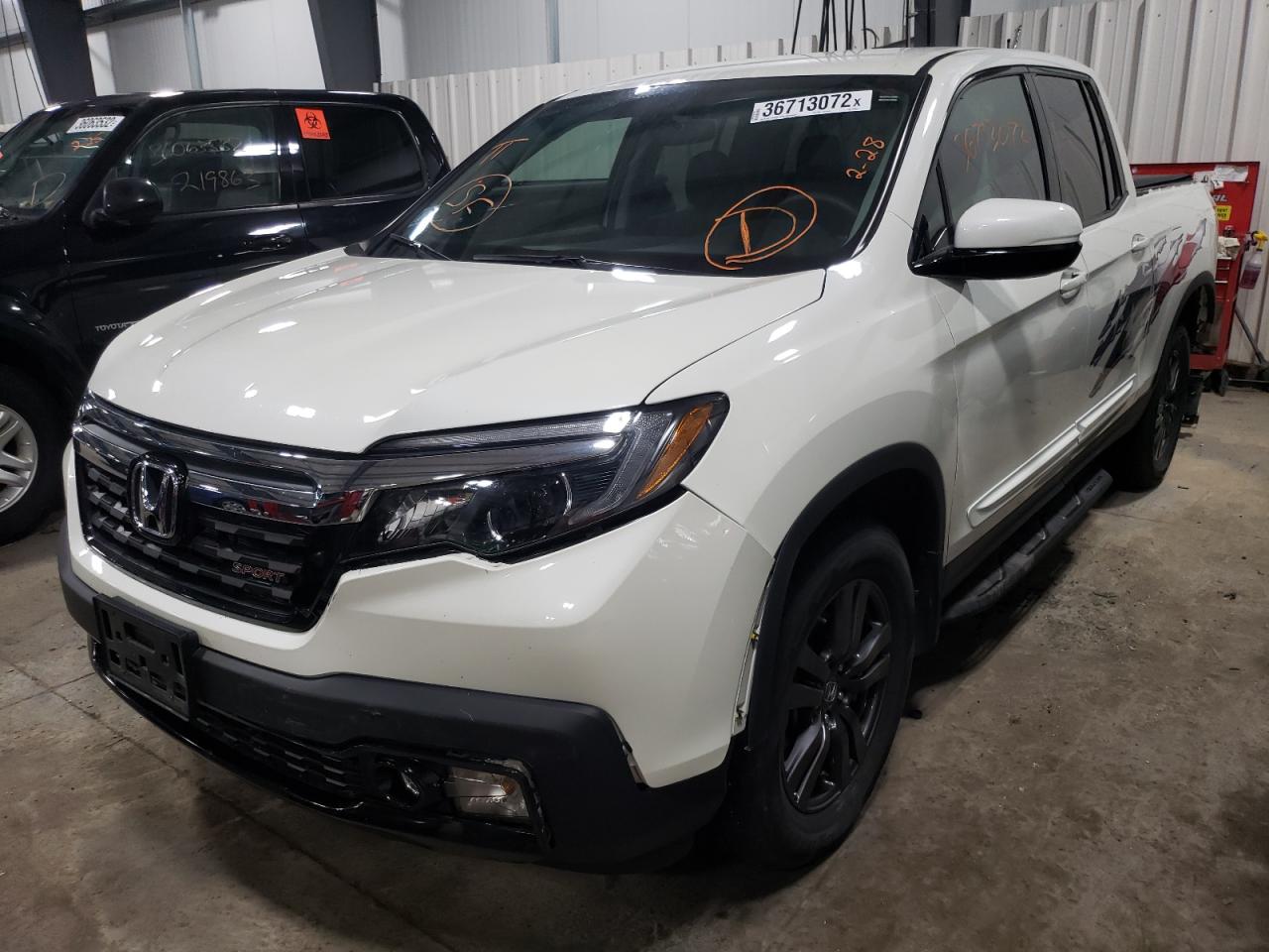 Photo 2 from auction – 2018 HONDA RIDGELINE with VIN 5FPYK3F19JB014343