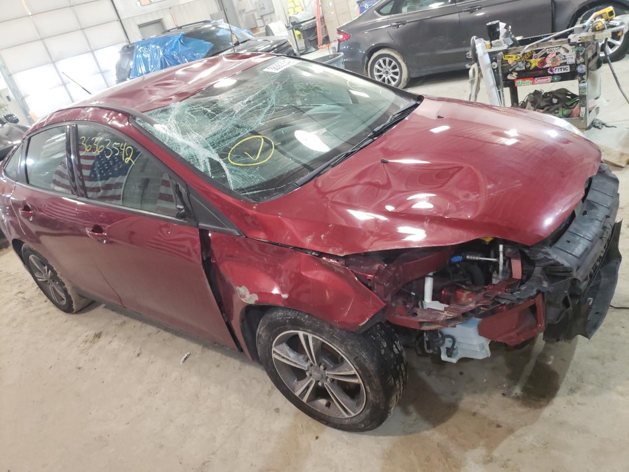 Photo 9 from auction – 2013 FORD FOCUS SE with VIN 1FADP3F21DL350898