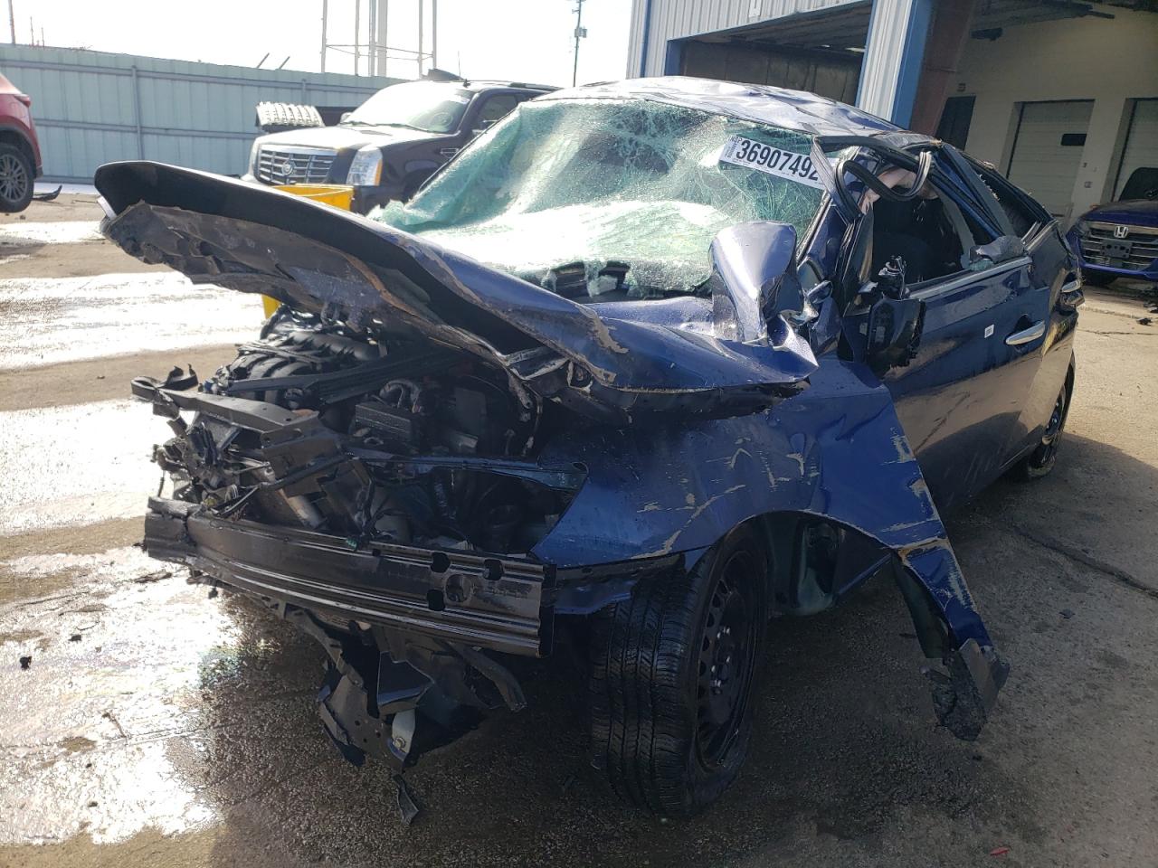 Photo 2 from auction – 2016 NISSAN SENTRA S with VIN 3N1AB7AP2GY219788