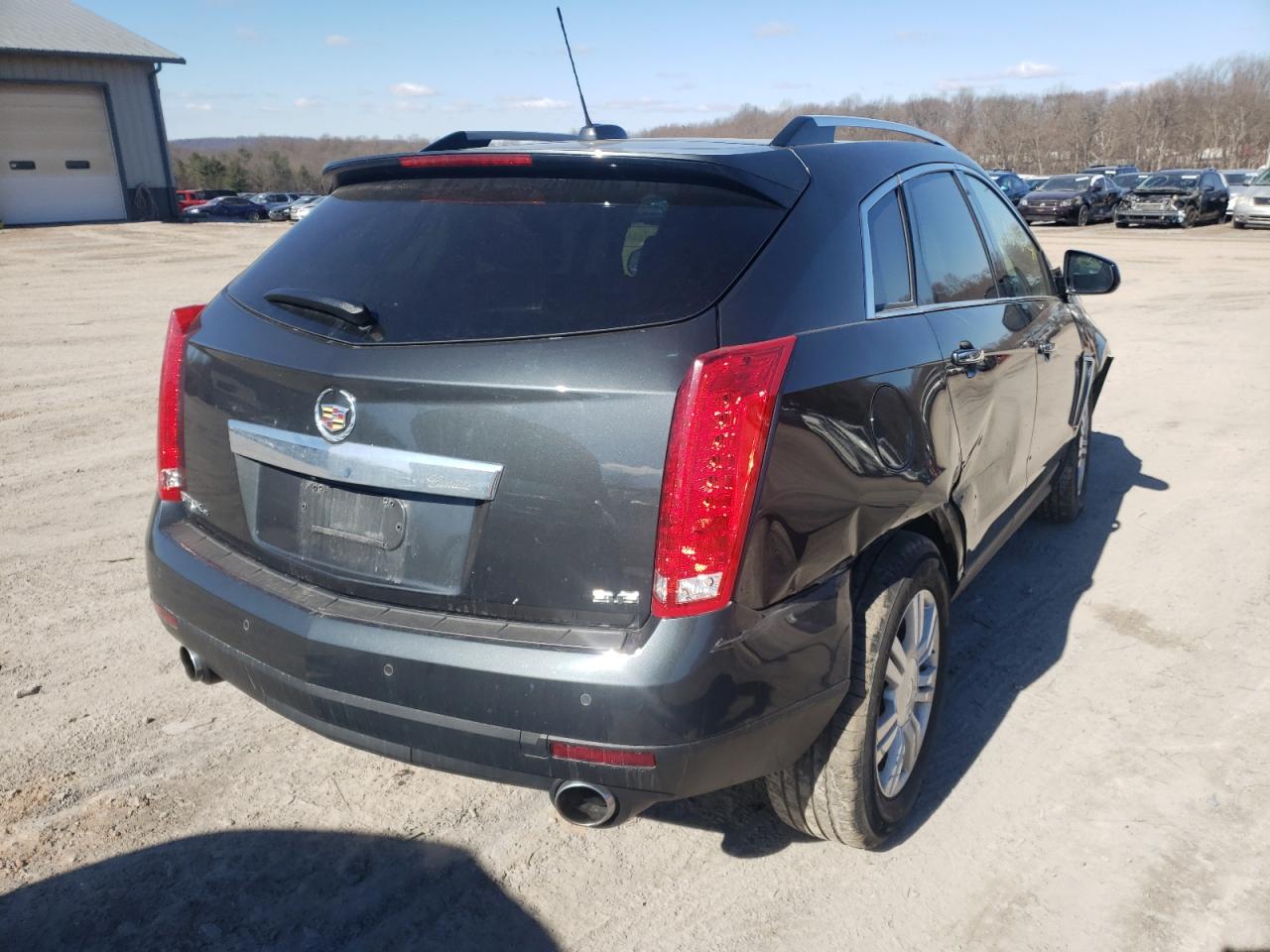 Photo 4 from auction – 2015 CADILLAC SRX LUXURY with VIN 3GYFNEE30FS619642