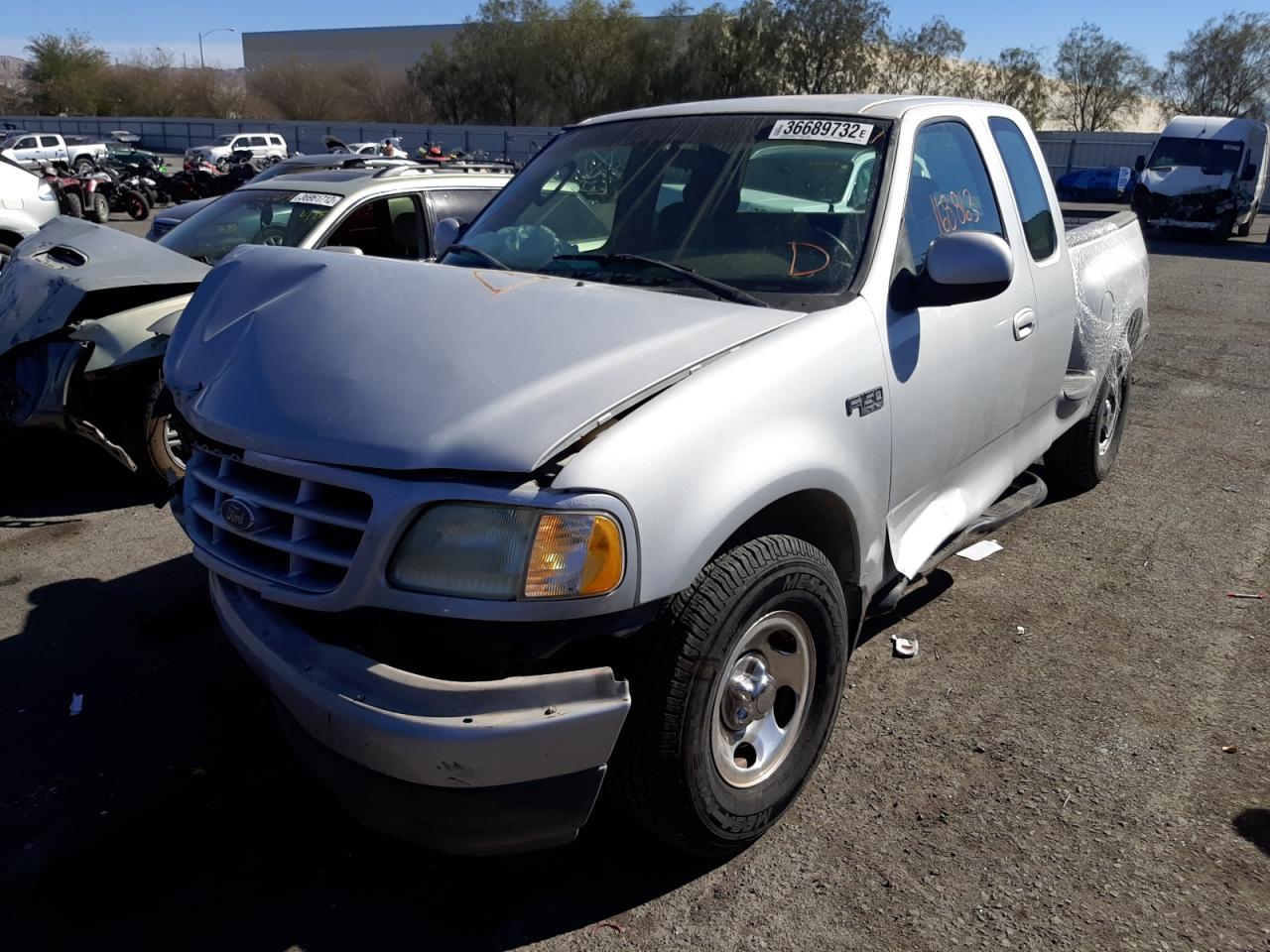 Photo 2 from auction – 2003 FORD F150 with VIN 1FTRX07283KD72303