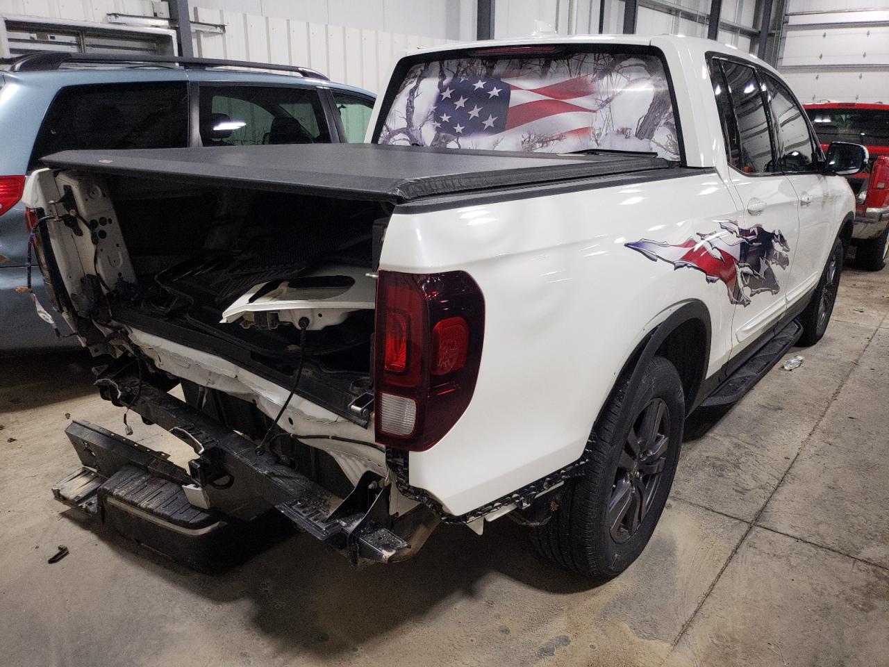 Фото 4 с аукциона – 2018 HONDA RIDGELINE с VIN 5FPYK3F19JB014343