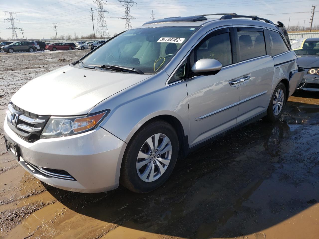 Photo 2 from auction – 2014 HONDA ODYSSEY EX with VIN 5FNRL5H62EB063890
