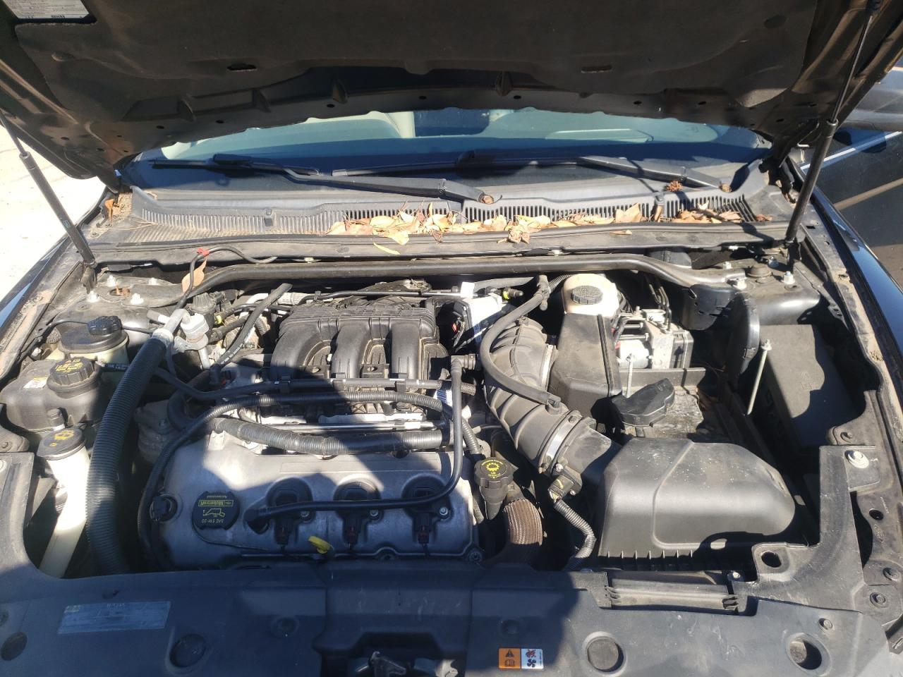 Photo 7 from auction – 2010 FORD TAURUS SE with VIN 1FAHP2DW8AG132074