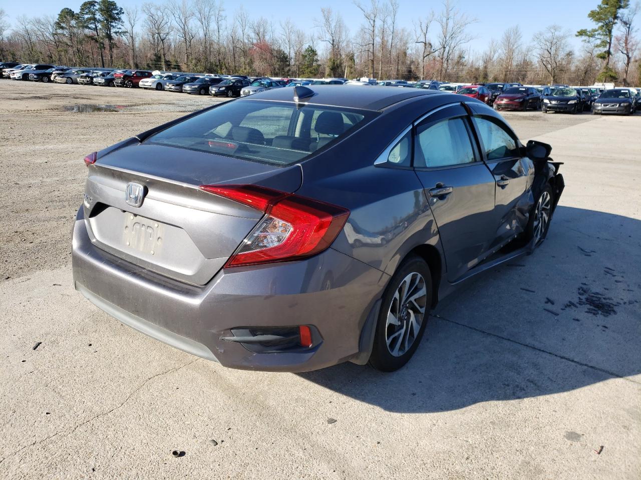 Photo 4 from auction – 2018 HONDA CIVIC EX with VIN 2HGFC2F7XJH596296