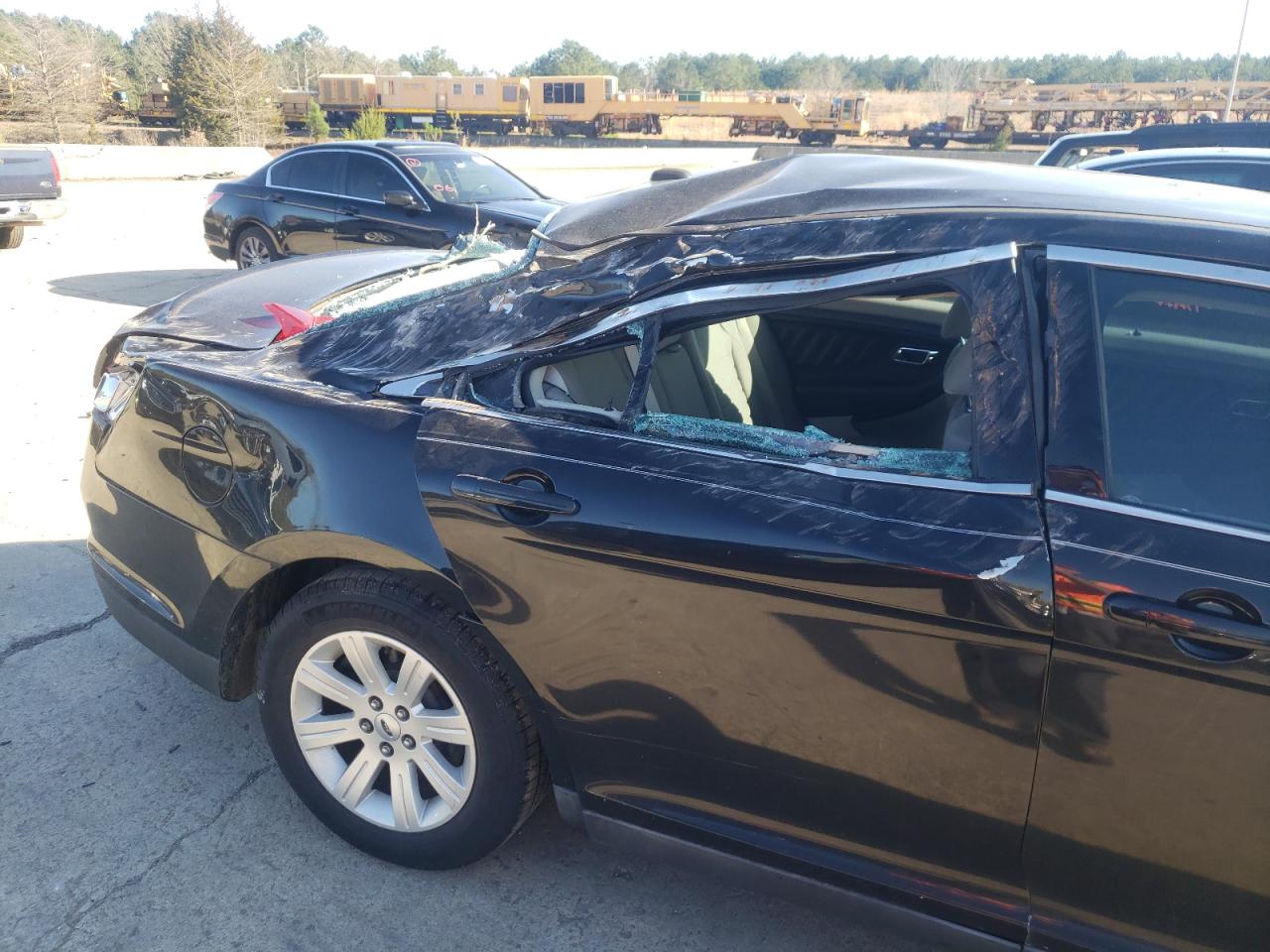 Photo 9 from auction – 2010 FORD TAURUS SE with VIN 1FAHP2DW8AG132074