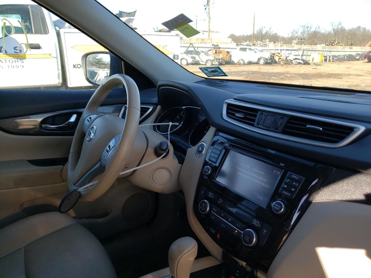Photo 9 from auction – 2015 NISSAN ROGUE S with VIN 5N1AT2MV5FC814418
