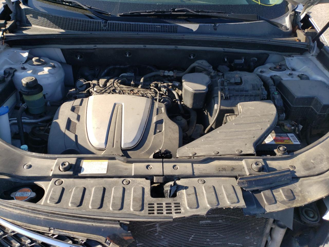 Photo 7 from auction – 2012 KIA SORENTO SX with VIN 5XYKWDA25CG283699