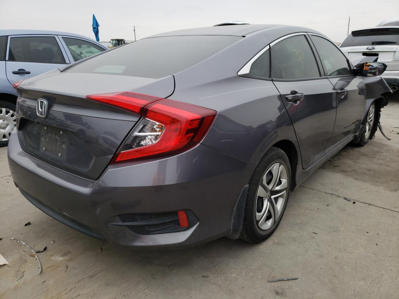 Photo 4 from auction – 2018 HONDA CIVIC LX with VIN 19XFC2F54JE018199